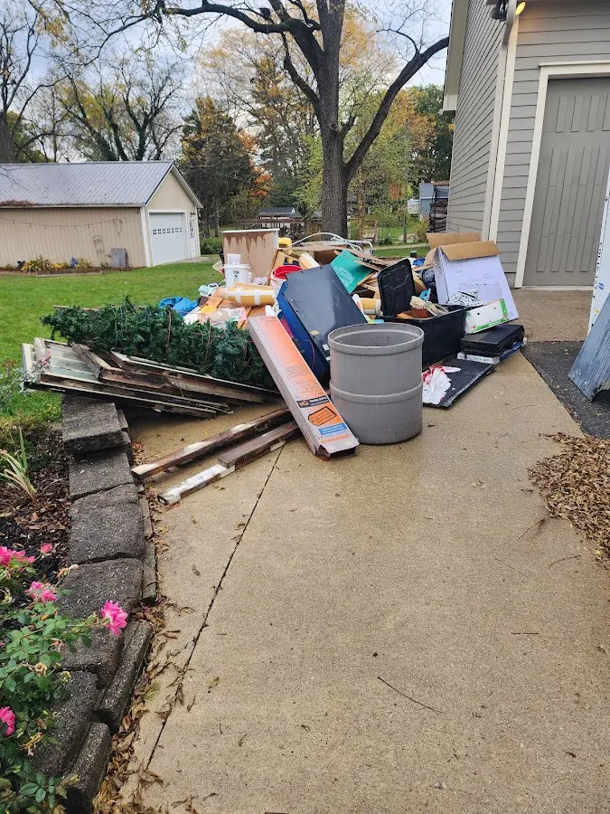 Dumpster being loaded with debris for Residential Dumpster Rental in Rotonda